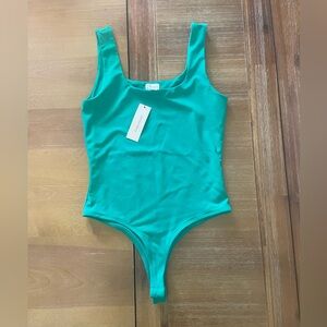 New with tags Francesca‘s boutique green bodysuit tank top size small